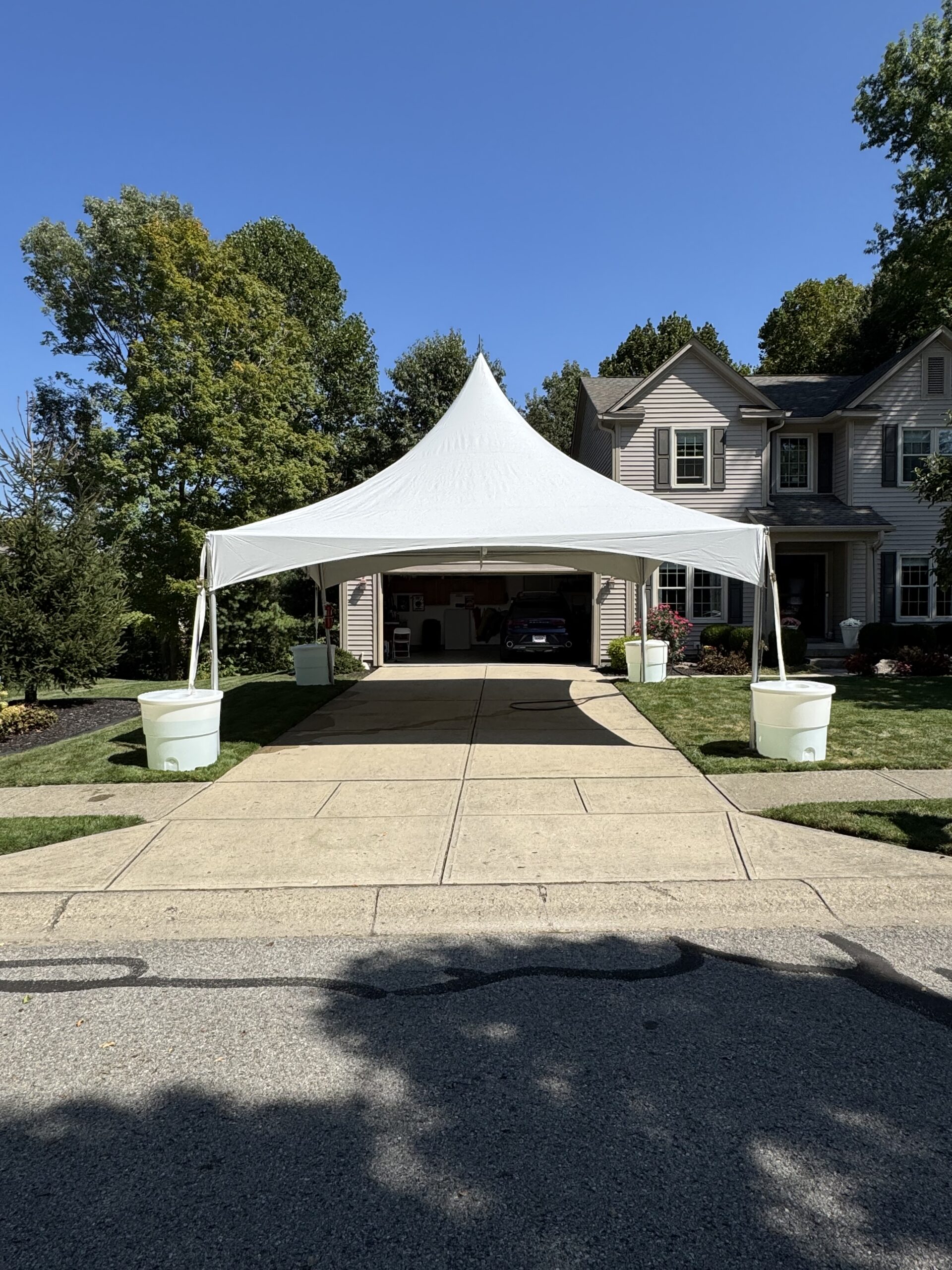 Giffty tent ballast system driveway patio setup Indiana Noblesville Tent